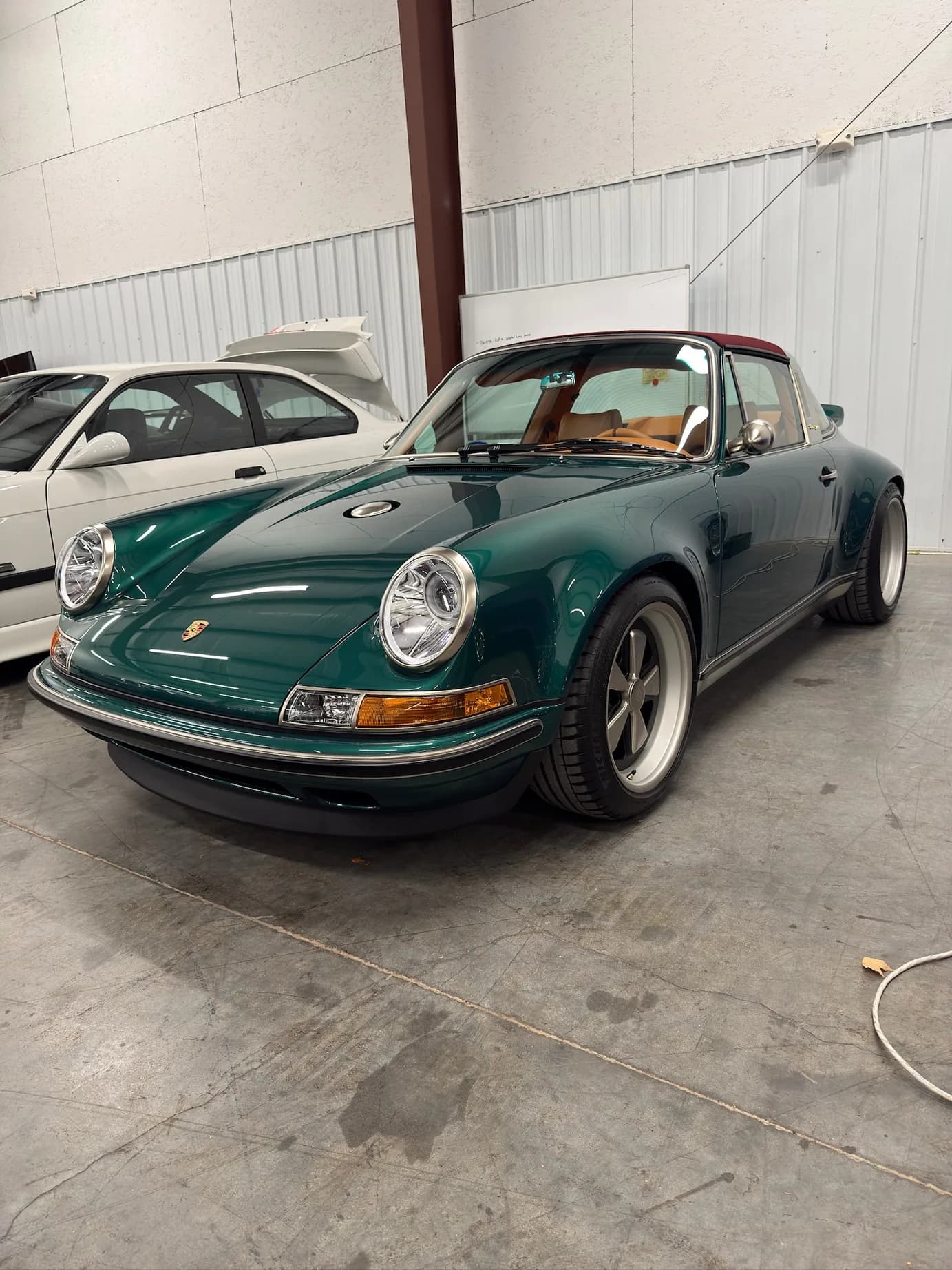Front three-quarter view of the Singer 911, targa top up
