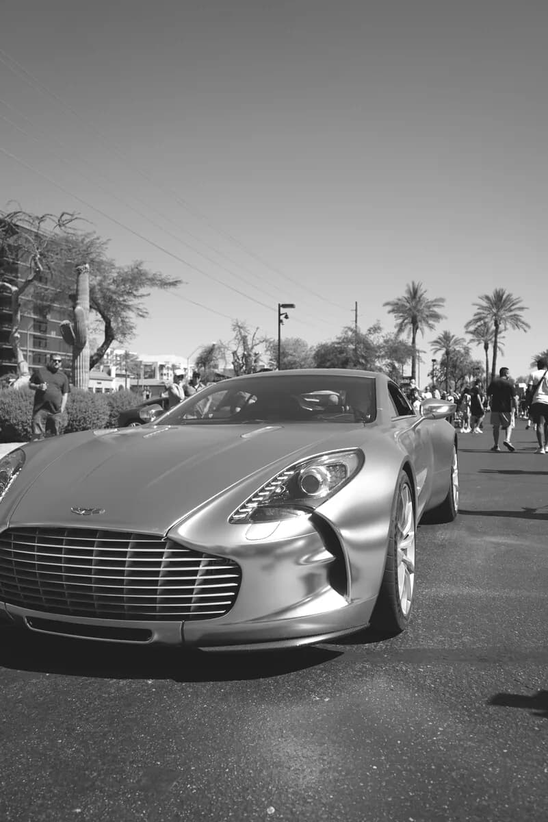 An Aston Martin One-77 on the street at Tires and Timepieces